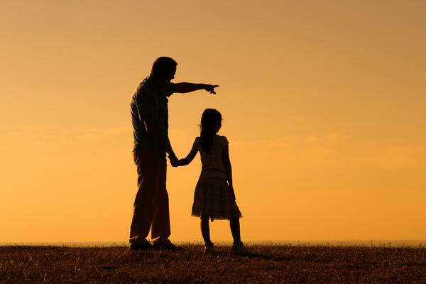 happy-father-and-daughter-spending-time-in-nature-photo