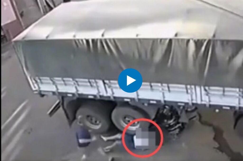 What If There Was No Helmet? Biker Survives Truck’s Wheel